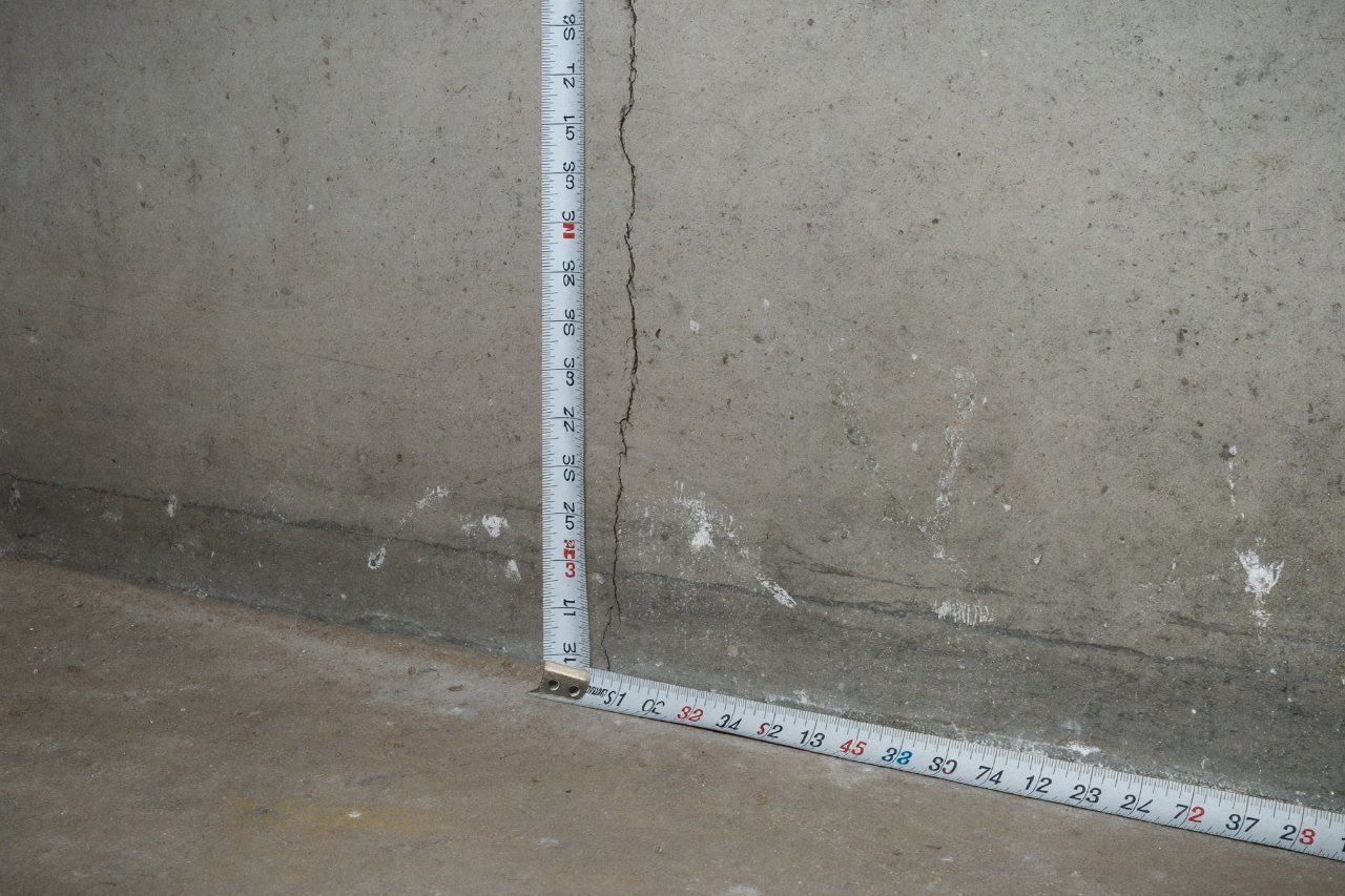 Vertical crack in a poured concrete basement wall