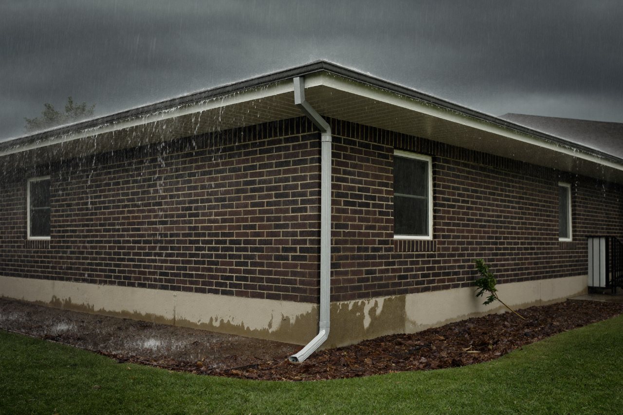 Rain pooling against a home foundation